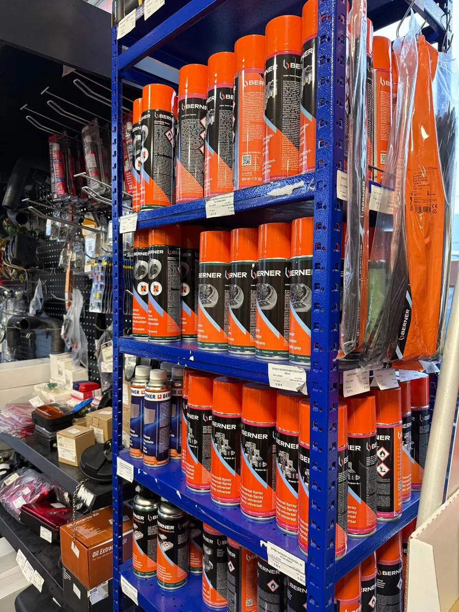 Shelves with sprays and chemicals for machinery