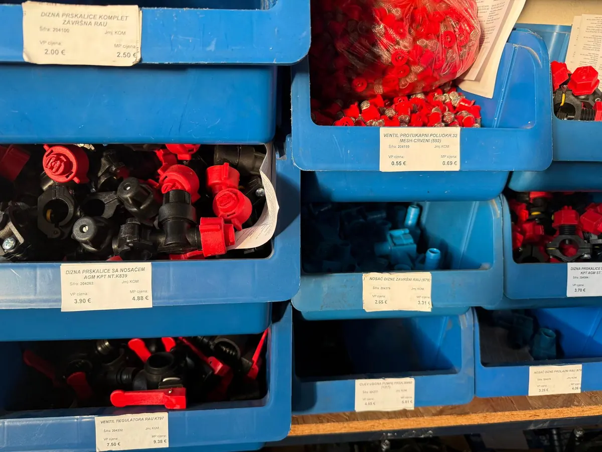 Small parts in blue boxes