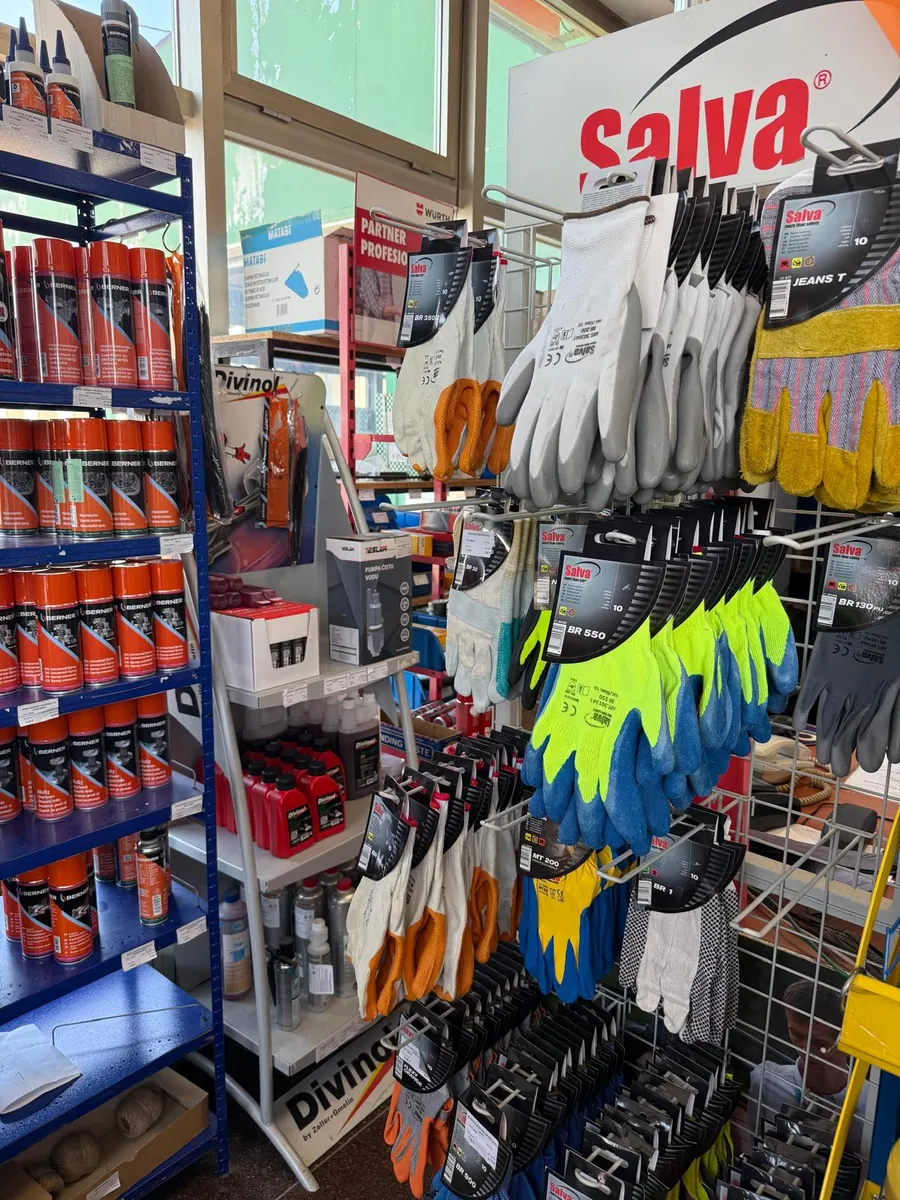 Work gloves and tools on a stand